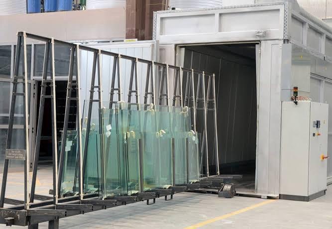 Strength & durability — glass panels loaded into a heat soak testing chamber